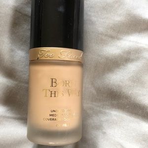 Foundation, setting powder, and brush.